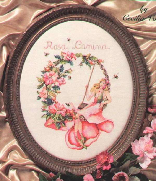 Rosa canina . Flowers, leaves, trees