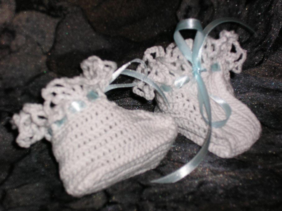 Пинетки от костюмчика. Детское