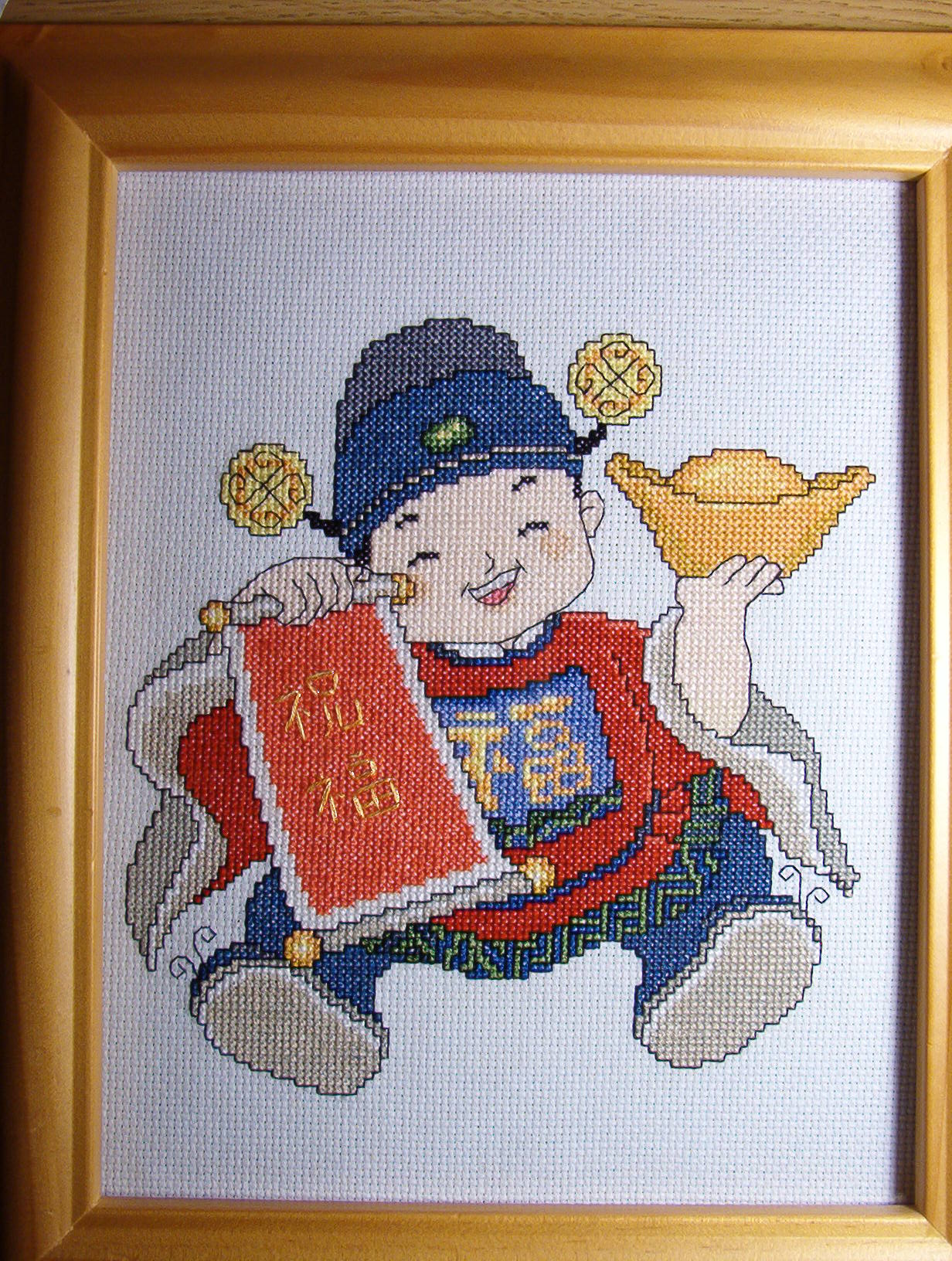 'Be wealthy'. cross stitch
