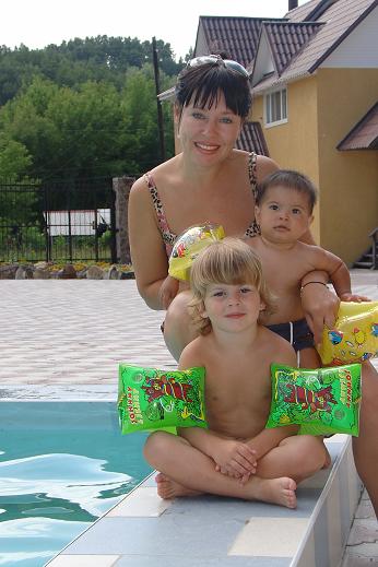 Выловила из бассейна. Третий сын и первые два:-)