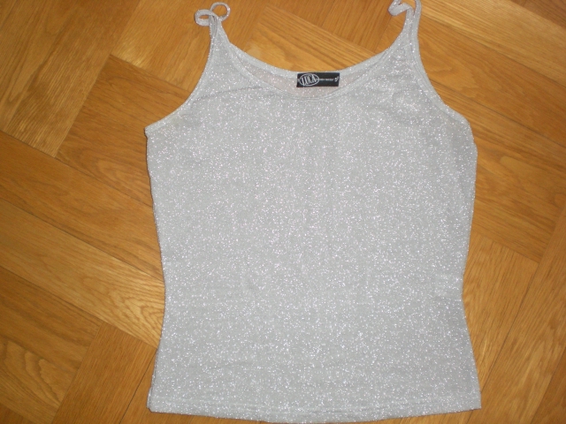 топ сербристый. 