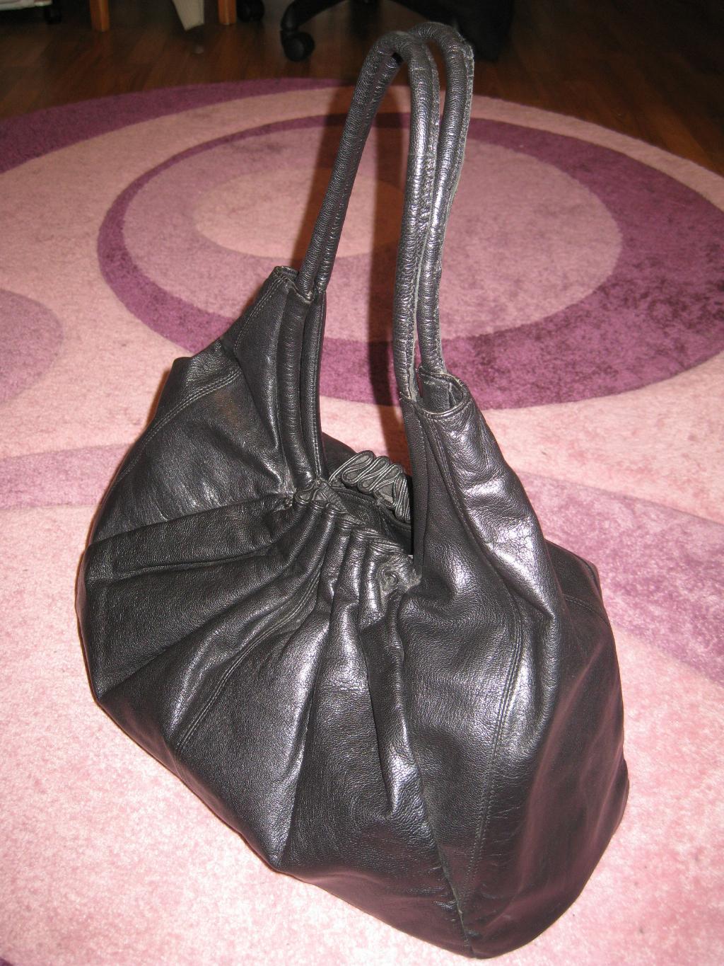 новая сумка-мешок из натур кожи привезная. сумки