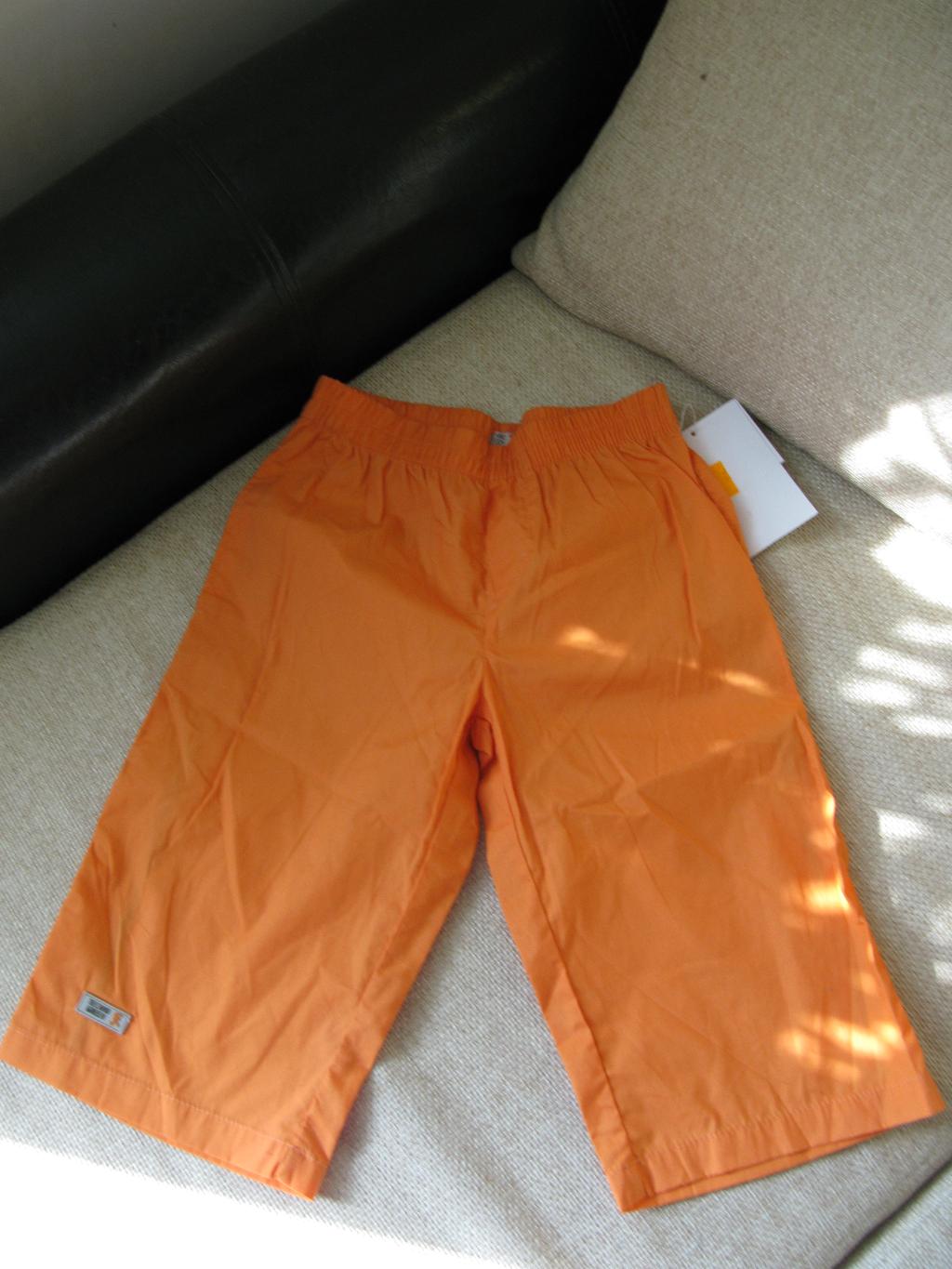 оранжевые капри. 