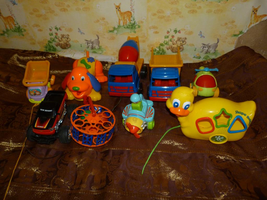 музыкальная уточка сортер. Игрушки