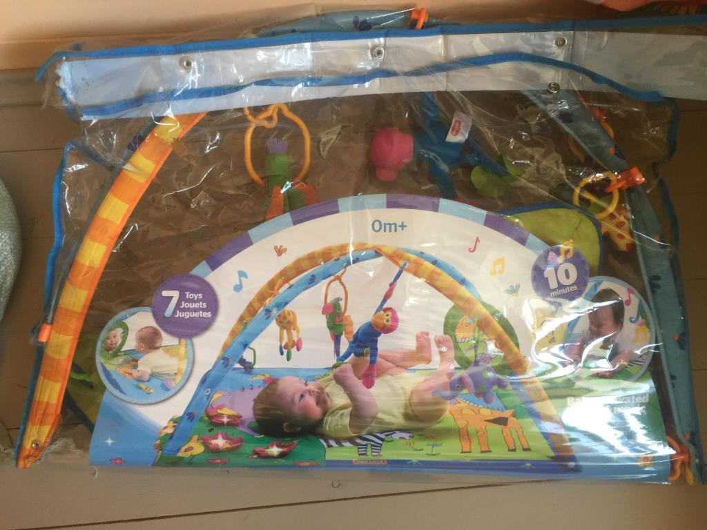 Развивающий коврик Тинилав . Игрушки б/у