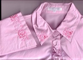 Розовая блузка.