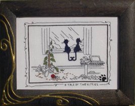 Calico crossroads. A Tale Of Two Kitties