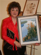 Наталья Александровна со своей работой