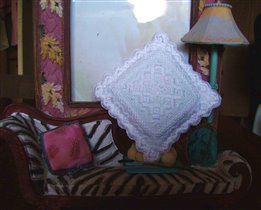 Игольница  вышито нитками из набора.