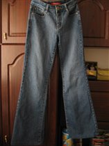 джинсы новые(вид спереди)