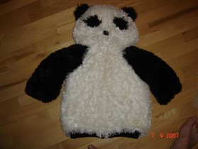 Панда лежит