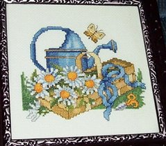 Лейка с ромашками