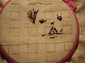 Начала вышивать мопсика.