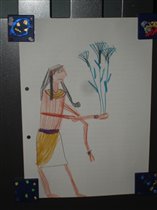 Житель Древнего Египта держит в руке цветы лотоса