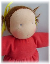 Куколка с озорными хвостиками