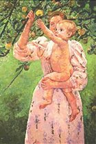BABY REACHING FOR AN APPLE