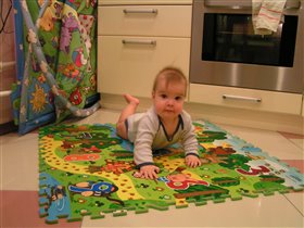 Тиша на коврике