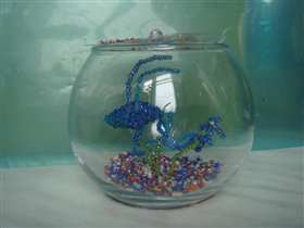 Синяя рыбка в аквариуме