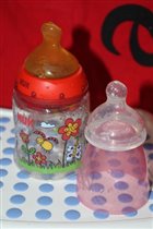 Бутылочка NUK + 2 соски к ней 150 руб