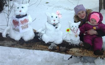 Снежное семейство кошачьих