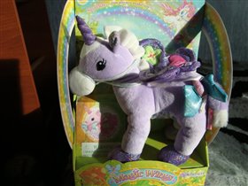 Единорог Искорка с волшебной бабочкой.