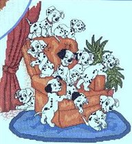 щенки далматина на кресле