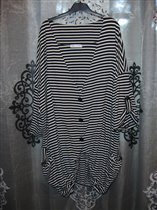 туника б/у, х/б,идет от 48 до 68 экв.2000