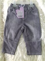 новые джинсы  на 9М, 12м 18м цена 200 руб